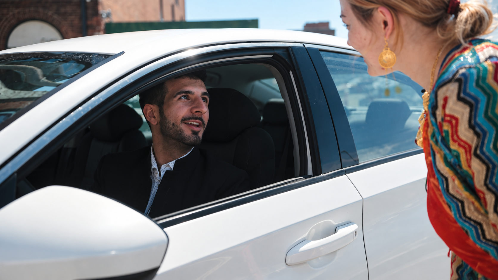 Aram Shkur in a white car during the Bayda shoot