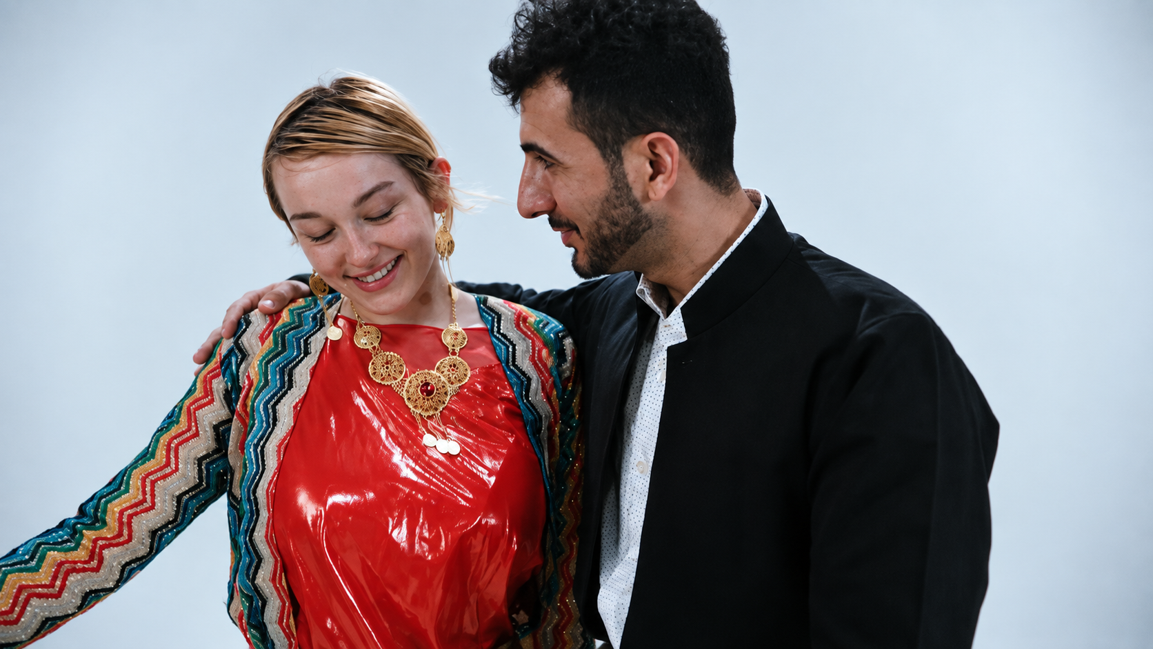 Aram and a performer in traditional dress